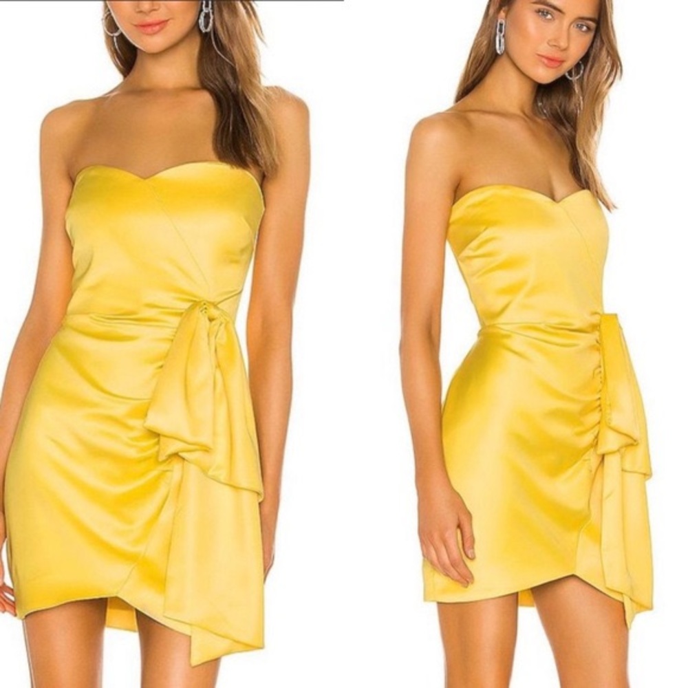 Likely yellow kika cocktail dress